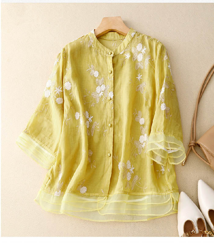 Elegant Floral Embroidered Blouse with Ruffle Cuffs and Button Front