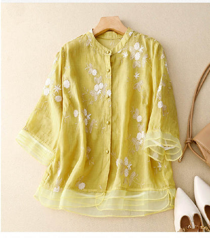 Elegant Floral Embroidered Blouse with Ruffle Cuffs and Button Front