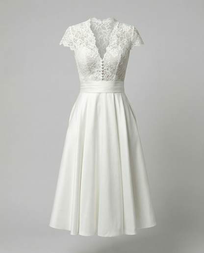 Elegant White Wedding Dress with Lace Bodice and Full Skirt