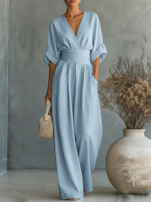 Elegant Wide Leg Jumpsuit with V-Neckline and Wrap Waist Band