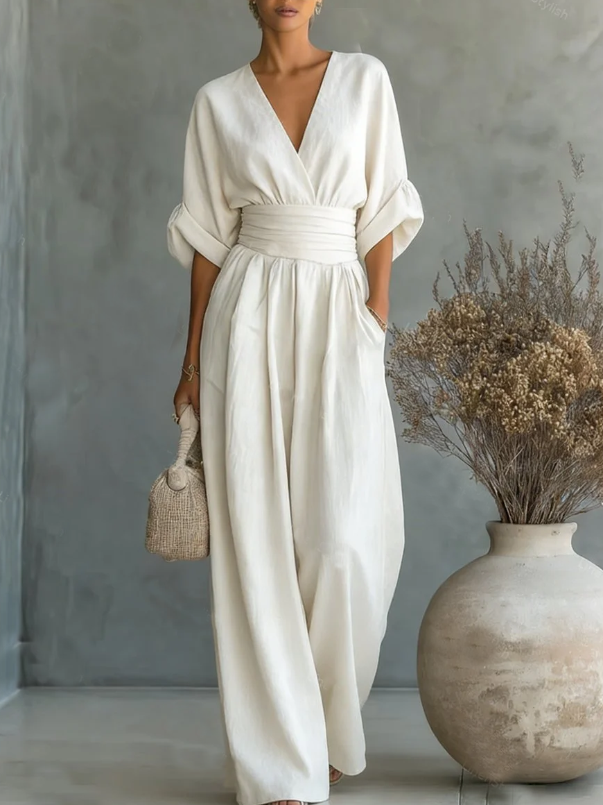 Elegant Wide Leg Jumpsuit with V-Neckline and Wrap Waist Band