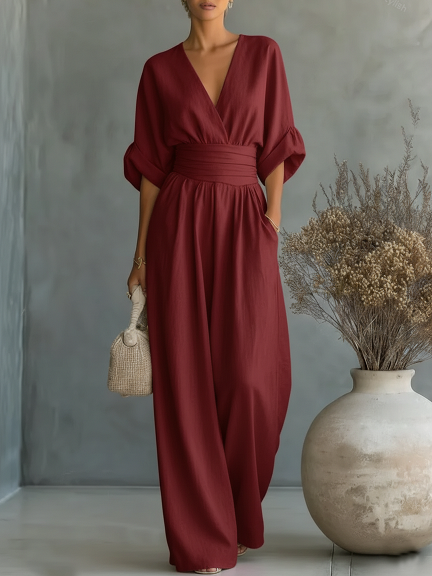 Elegant Wide Leg Jumpsuit with V-Neckline and Wrap Waist Band