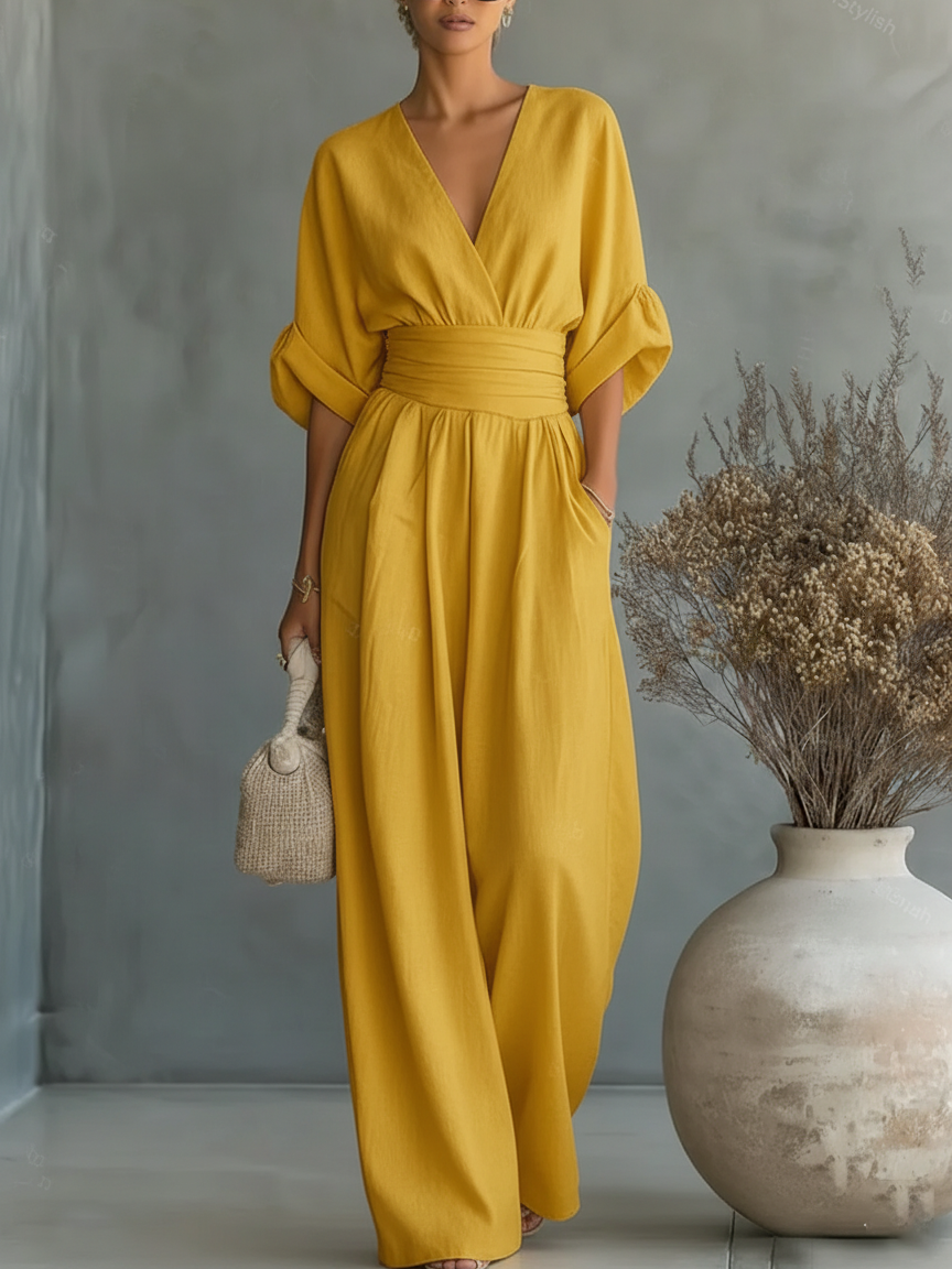 Elegant Wide Leg Jumpsuit with V-Neckline and Wrap Waist Band