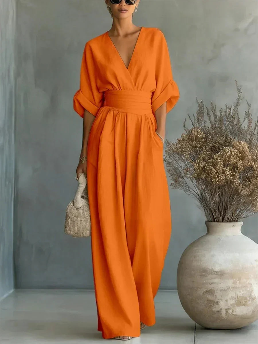 Elegant Wide Leg Jumpsuit with V-Neckline and Wrap Waist Band