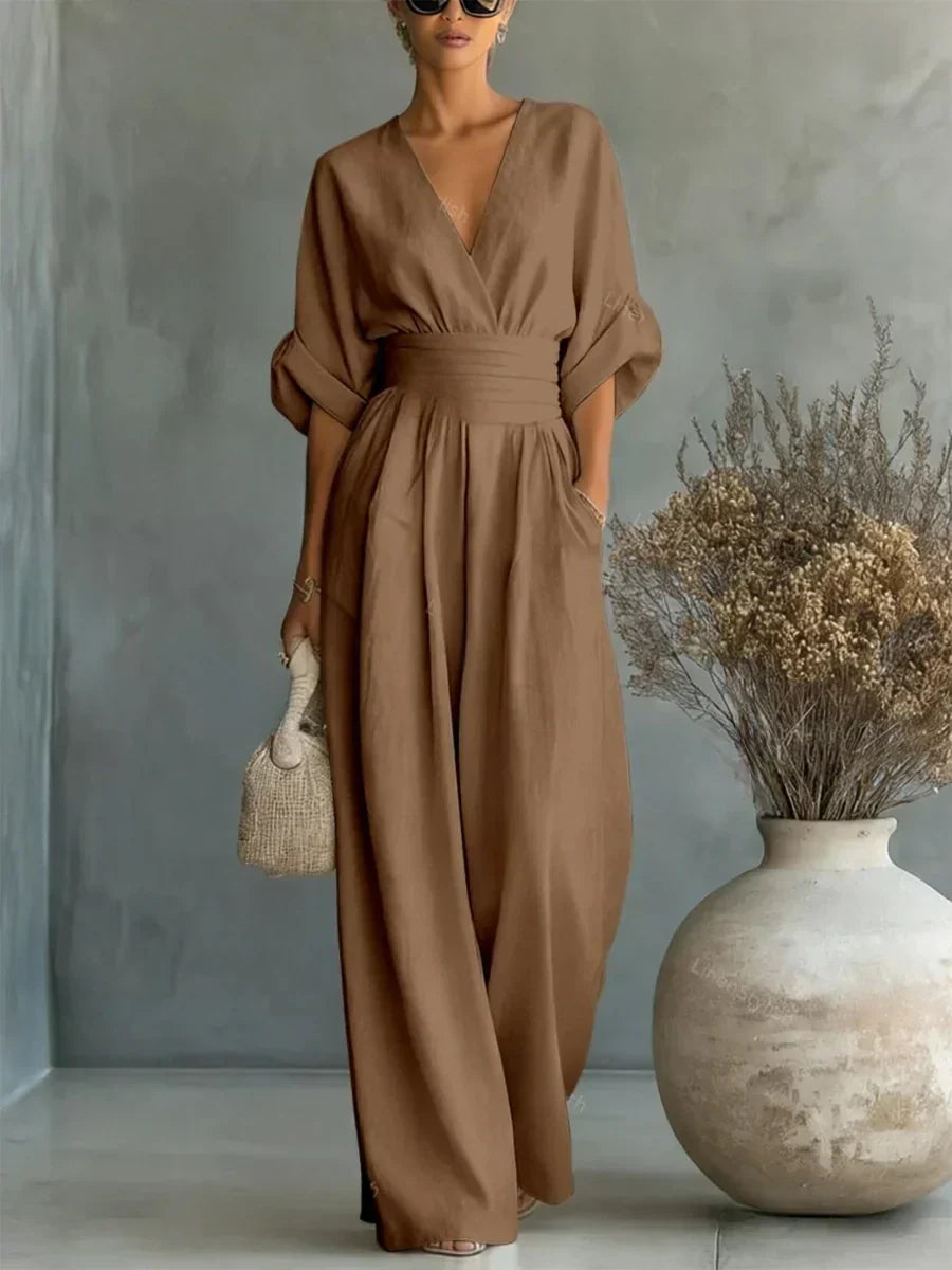 Elegant Wide Leg Jumpsuit with V-Neckline and Wrap Waist Band