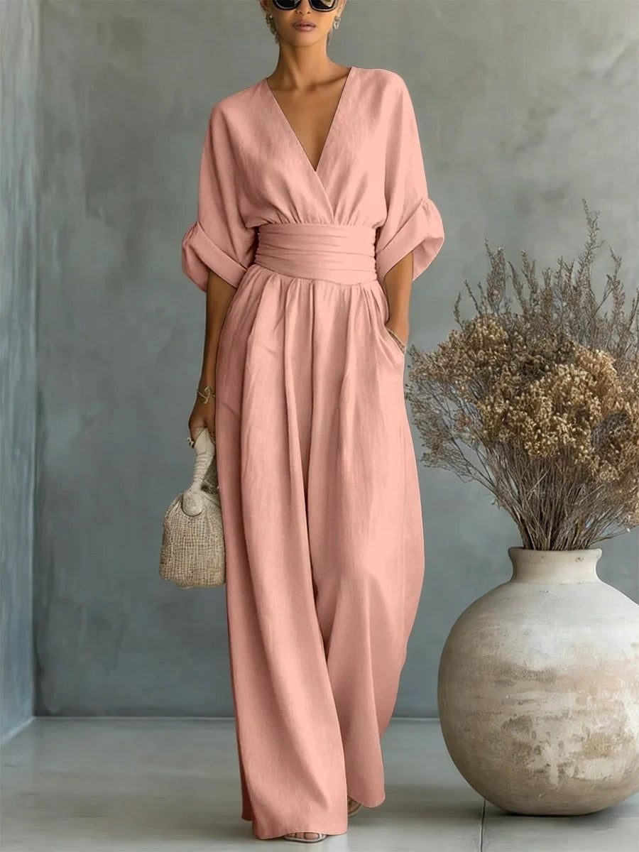Elegant Wide Leg Jumpsuit with V-Neckline and Wrap Waist Band