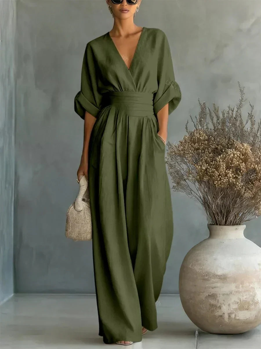 Elegant Wide Leg Jumpsuit with V-Neckline and Wrap Waist Band