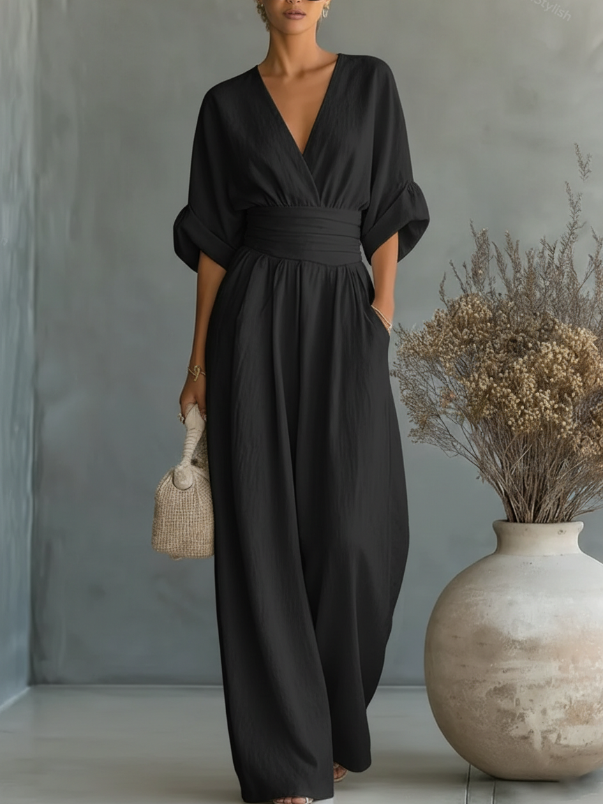 Elegant Wide Leg Jumpsuit with V-Neckline and Wrap Waist Band