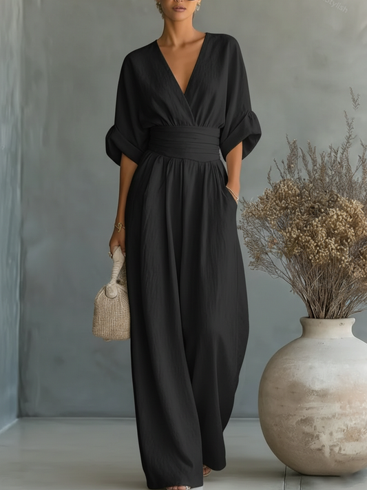 Elegant Wide Leg Jumpsuit with V-Neckline and Wrap Waist Band