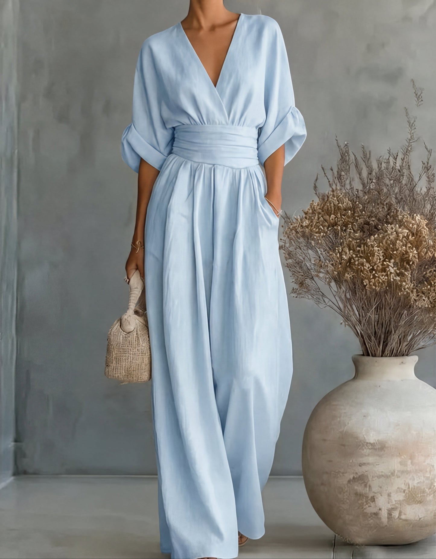 Elegant Wide Leg Jumpsuit with Wrap V-Neckline and Cinched Waist