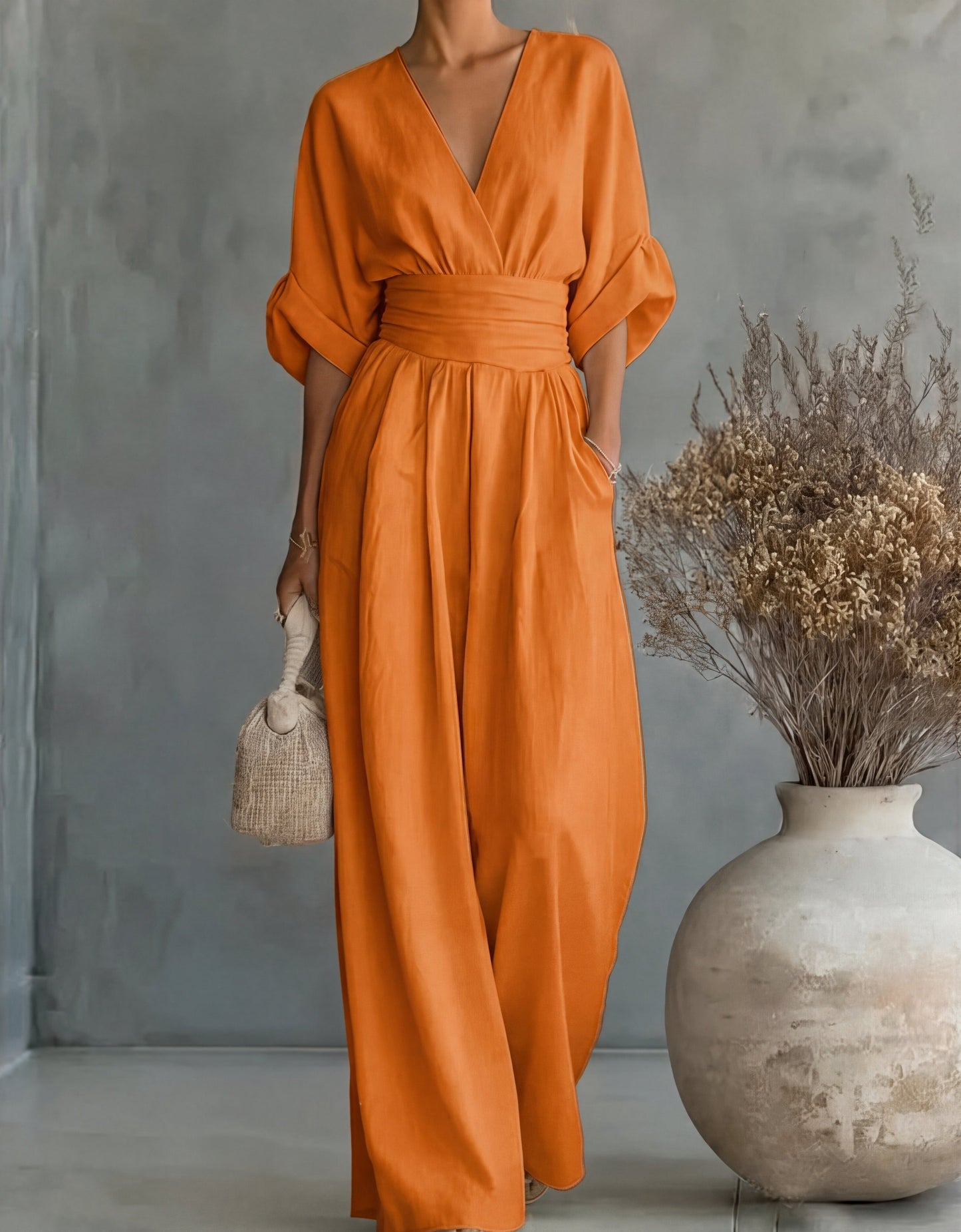 Elegant Wide Leg Jumpsuit with Wrap V-Neckline and Cinched Waist