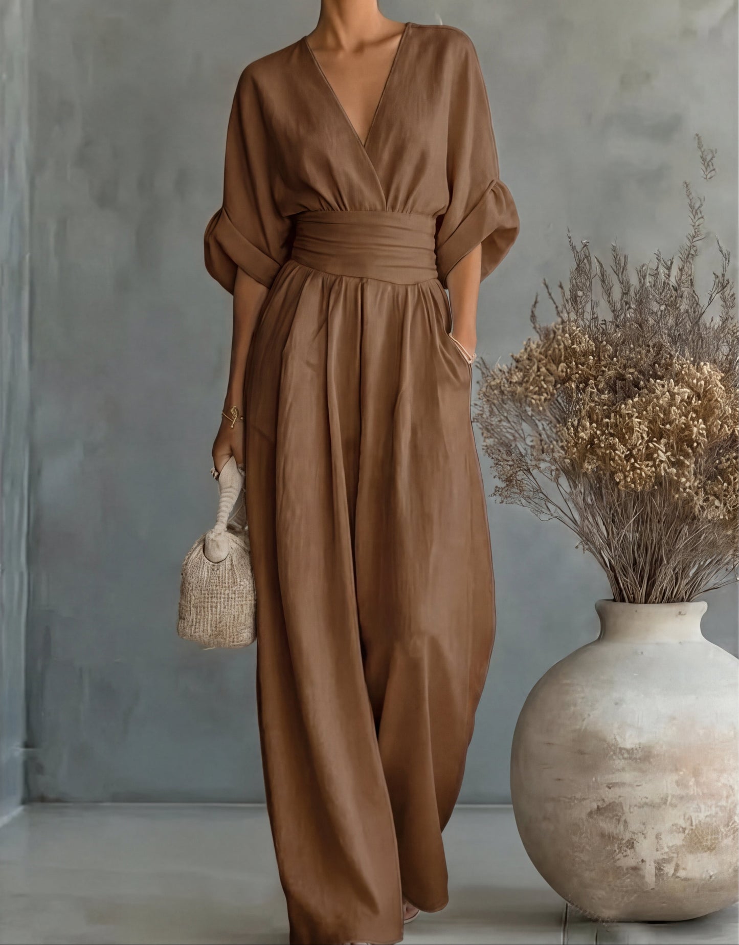 Elegant Wide Leg Jumpsuit with Wrap V-Neckline and Cinched Waist