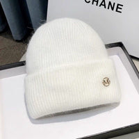 Fluffy Knit Beanie with Gold Metal Badge Detail