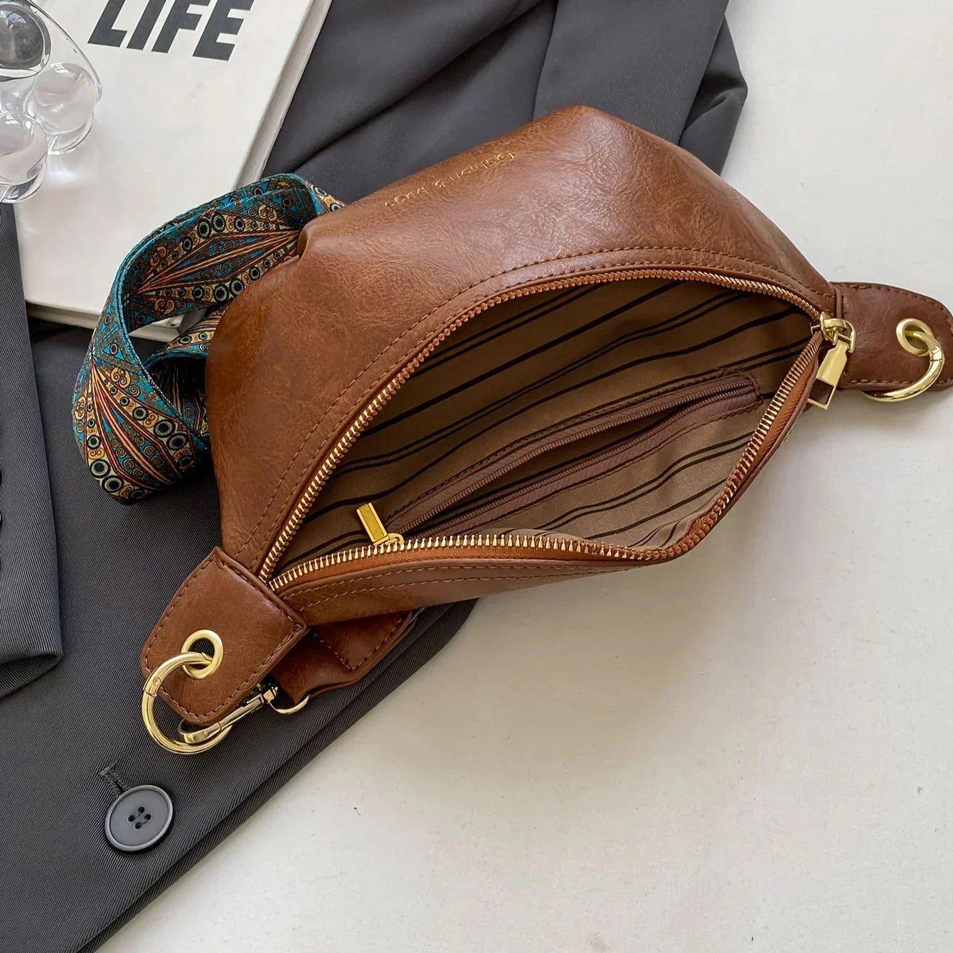 Leather Crossbody Bag with Boho Patterned Strap and Front Zip Pocket