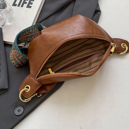 Leather Crossbody Bag with Boho Patterned Strap and Front Zip Pocket