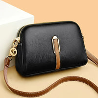Leather Crossbody Bag with Gold Hardware and Contrast Strap Detail