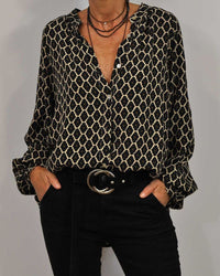 Relaxed Blouse with V-Neckline and Long Sleeves