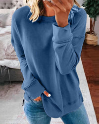 Relaxed Crew Neck Sweatshirt with Side Slits and Raglan Sleeves