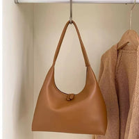 Sleek Leather Shoulder Bag with Zip Closure
